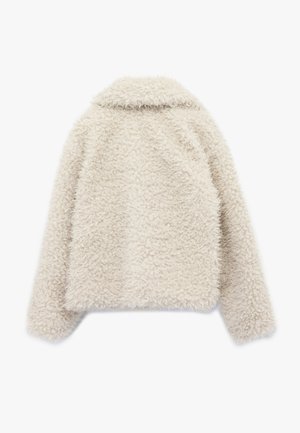 Nepbont jasje in een crème kleur, met een kraag en lange mouwen, een zachte textuur en een boxy silhouet. De achterkant toont het luxe materiaal.