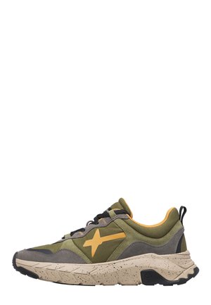 Low-top olive green and gray sneaker with yellow star logo, speckled beige sole, black laces, and pull tab at heel, viewed from the side.