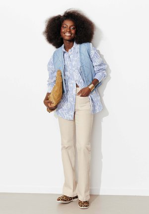 EUGENE EN TOILE - Jean flare - beige