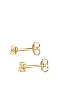 Guldtonade studörhängen med tre klara cubic zirconia-stenar i en vertikal arrangemang, med en elegant post och fjärilslås.