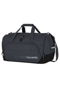 Sac de voyage en tissu gris texturé et résistant avec des accents noirs, comportant des poignées doubles, une bandoulière et plusieurs compartiments zippés.