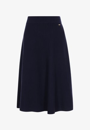 Tumedat sinised, põlveni ulatuvad seelikud, mis on valmistatud pehmest kangast, millel on sobiv vöökoht, sujuv tekstuur ja peen logodetail.