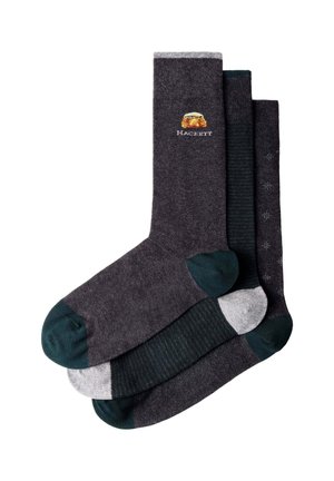 Three pairs of men's dark gray socks with different toe and heel colors, one pair features a small embroidered logo with text "Hackett".