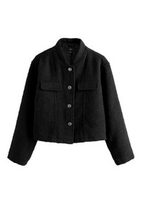 Giacca corta nera in tessuto strutturato. Presenta un colletto rotondo, chiusura frontale con bottoni, due tasche sul petto e maniche lunghe.