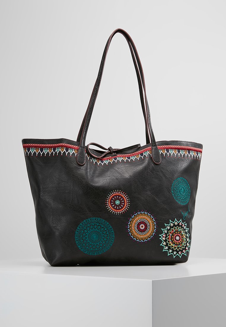 sac desigual reversible