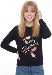 Felpa nera con scritta in oro "Buon Natale" e motivi di agrifoglio in rosso e verde. Maniche lunghe, polsini a costine e vestibilità comoda.