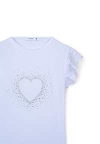 Camicetta bianca a maniche corte con maniche in pizzo arricciate e un design di cuore in strass al centro.