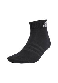 Czarne skarpetki Adidas do kostek z ribbą na górze i białym logo na górnej stronie, zaprezentowane na białym tle.