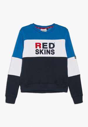 Bluza z długim rękawem w kolorach niebieskim, białym i czarnym, z napisem "RED SKINS" drukowanym dużymi literami na piersi.