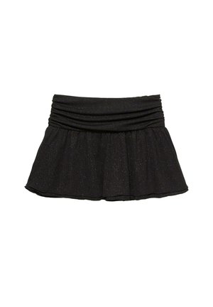 Čierna korčuliarska sukňa vyrobená z mäkkej tkaniny s textúrovaným povrchom a jemnými trblietkami. Má nazhromaždený pás a rozšírený spodný okraj.