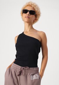 GAP Petite HERITAGE - Treniņtērpa apakšdaļas - wassel