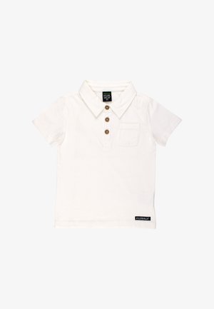 Witte polo met korte mouwen van katoen, voorzien van een kraag, drie bruine knopen en een klein borstzakje. Merkenlabel zichtbaar op de zoom.