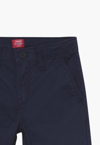 Levi's® 511 SLIM FIT - Chino kalhoty - navy blazer