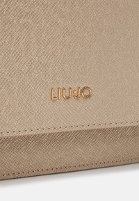 LIU JO CROSSBODY  - Borsa a tracolla - light gold-coloured