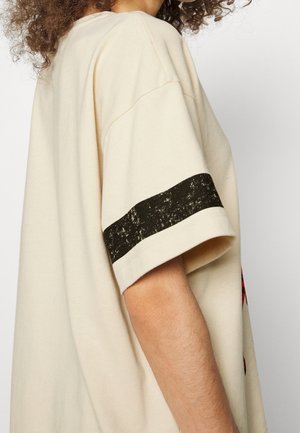 Print T-shirt - beige