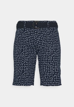 Shorts bleu marine avec une ceinture tissée texturée et un motif répétitif de formes abstraites blanches. Longueur mi-cuisse avec une coupe décontractée.