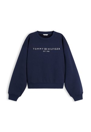 Temno modra majica z okroglo izrezom, dolgimi rokavi, rebrastimi manšetami in spodnjim robom ter belim napisom "TOMMY HILFIGER EST. 1985" na prsih.