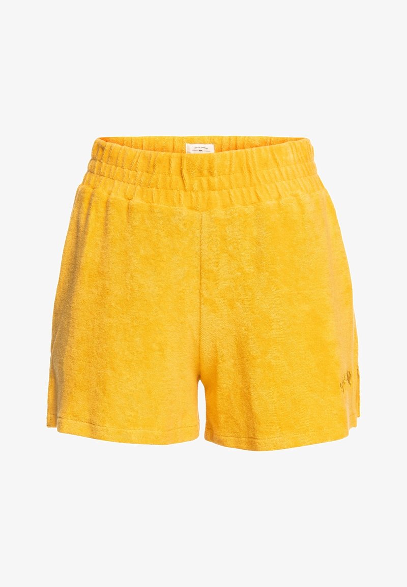 Shorts en éponge jaune avec une ceinture élastique ; présentent une texture douce, une forme décontractée et un design minimaliste, adaptés à un usage quotidien.