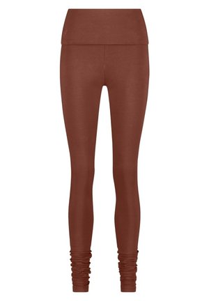 Braune Leggings mit einem breiten, umschlagbaren Bund. Glatte Textur mit einer taillierten Form und gerafftem Detail am Knöchel.