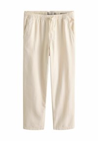 Pantalone boje kreme s elastičnom gumom i vezicom, izrađeni od mekanog materijala, sa bočnim džepovima.