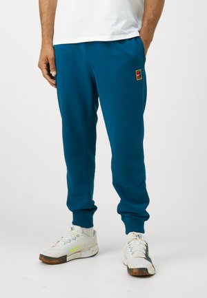 NIKECOURT HERITAGE PANT JOGGER - Pantalon de survêtement - blue force