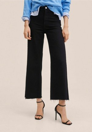 Vaqueros a campana - black denim