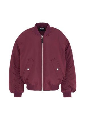 Burgundy bomber jacket with a zip-front, ribbed cuffs and hem, two side pockets, and smooth fabric featuring subtle stitching details.