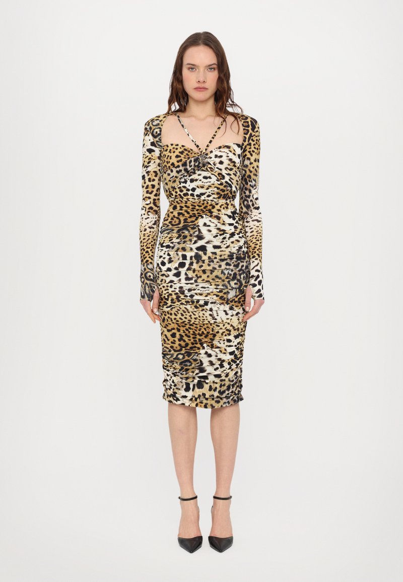 Leopard print dress with long sleeves, fitted silhouette, ruched texture, and deep neckline. Color palette includes shades of brown and cream.