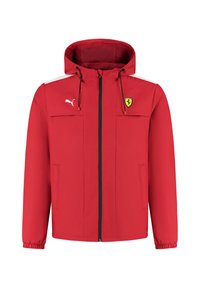 Czerwona kurtka przeciwdeszczowa z kapturem. Posiada białe akcenty, zamek błyskawiczny, kieszenie boczne oraz logo Ferrari na piersi. Wykonana z lekkiego materiału.