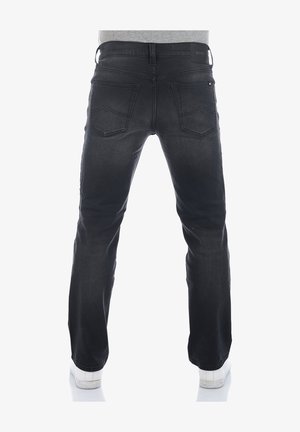 Black denim jeans with a straight leg design, featuring two back pockets and a visible brand label at the waistband. Smooth texture.
