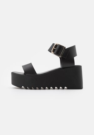 Sandalen met plateauzool - black