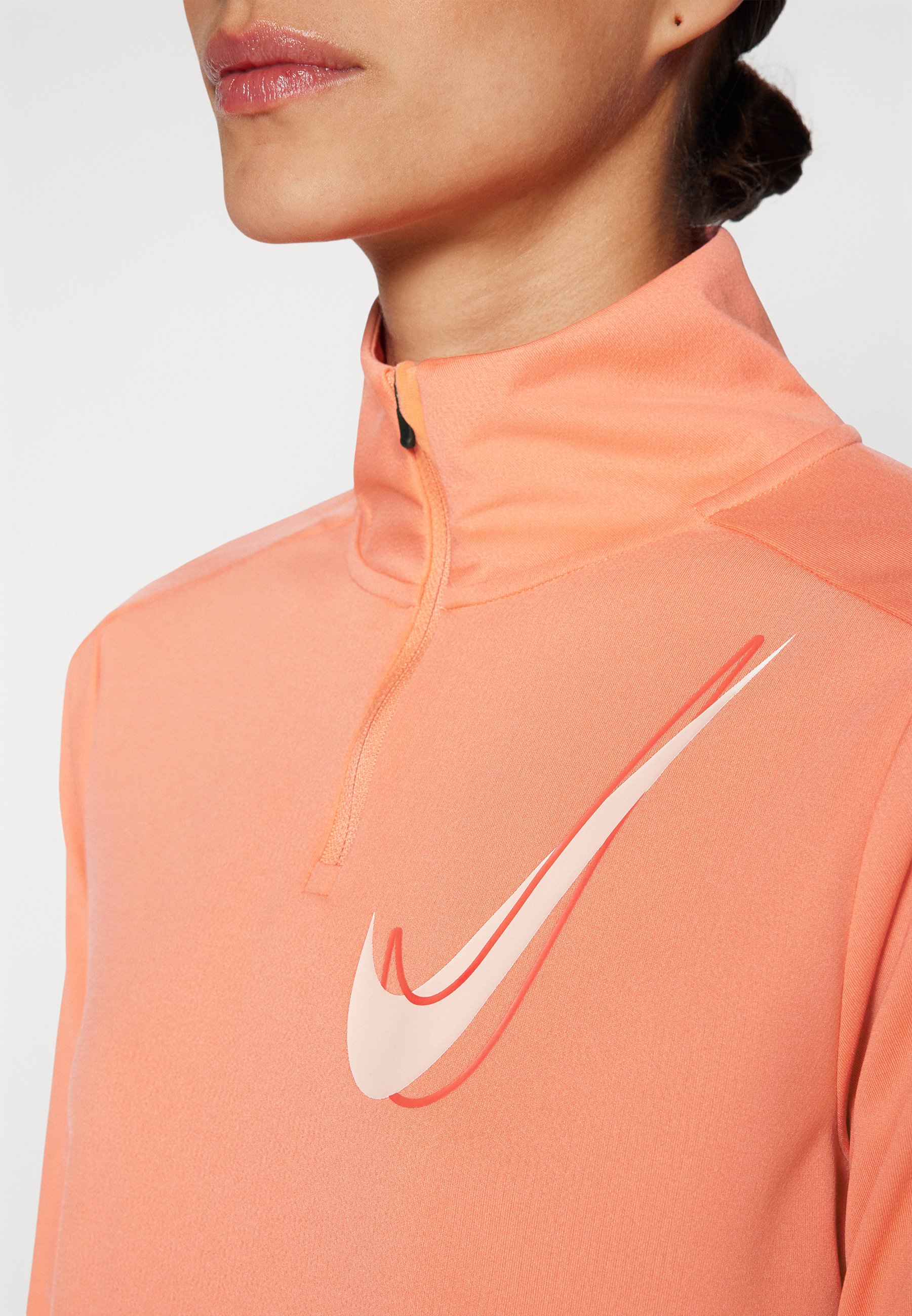 peach nike half zip