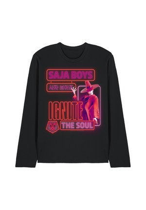 Black long-sleeve shirt with neon pink and red text "SAJA BOYS," Korean characters, "IGNITE THE SOUL," a lion head, and a stylized person in a wide-brimmed hat.