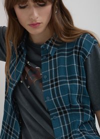 Calliope SANS MANCHES À CARREAUX - Camicia - une variante