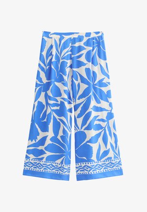 Blue and white wide-leg pants with a floral pattern, featuring a decorative trim at the hem and a smooth, lightweight fabric.