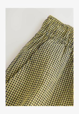 Geruite stoffen shorts in een geel- en marineblauw kleurenpalet, met een elastische tailleband en een zachte textuur.