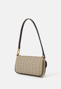 Shoulder bag in patterned beige fabric with a brown leather strap. Features a zip closure and gold-tone hardware accents.