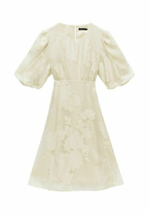 Ein cremefarbenes Kleid mit kurzen Puffärmeln, floralem Muster, rundem Ausschnitt und schmaler Taille, das einen verdeckten Reißverschluss im Rücken hat.