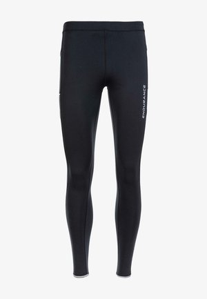 Black athletic leggings made of stretchy material with a smooth texture, featuring a reflective logo on the side and a slim fit design.