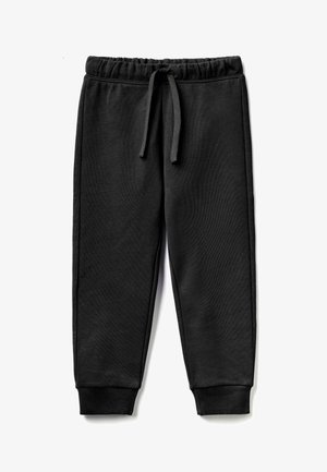 Zwarte joggingbroek met elastische tailleband, trekkoord en geribbelde manchetten, plat gelegd op een witte achtergrond.