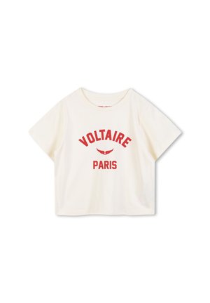 T-shirt court à manches courtes crème avec du texte rouge vif "VOLTAIRE PARIS" et un motif d'aile. Matière 100% coton douce avec une coupe décontractée.