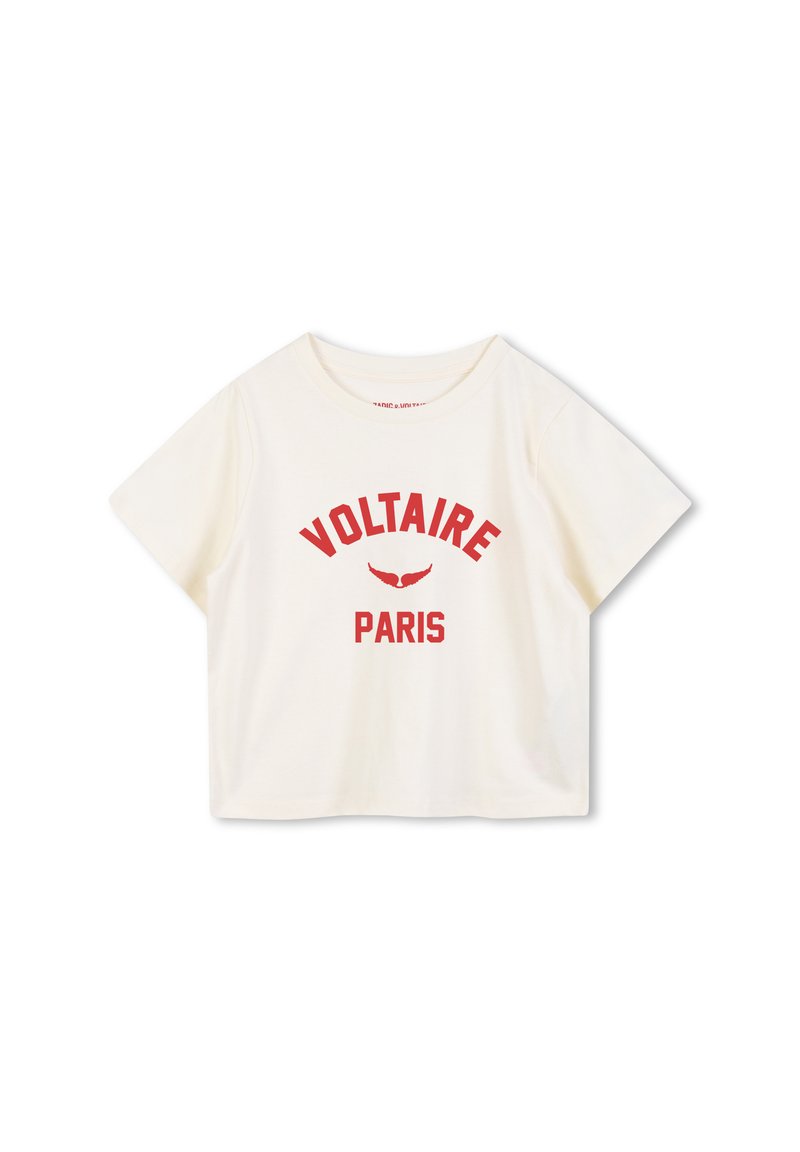 Camiseta corta de manga corta en crema con el audaz texto rojo "VOLTAIRE PARIS" y un gráfico de alas. Material de algodón suave con un corte relajado.