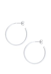 Pendientes de aro de plata con un acabado suave y pulido. Presentan un diseño circular simple y un cierre a presión seguro. Marcados con "925."