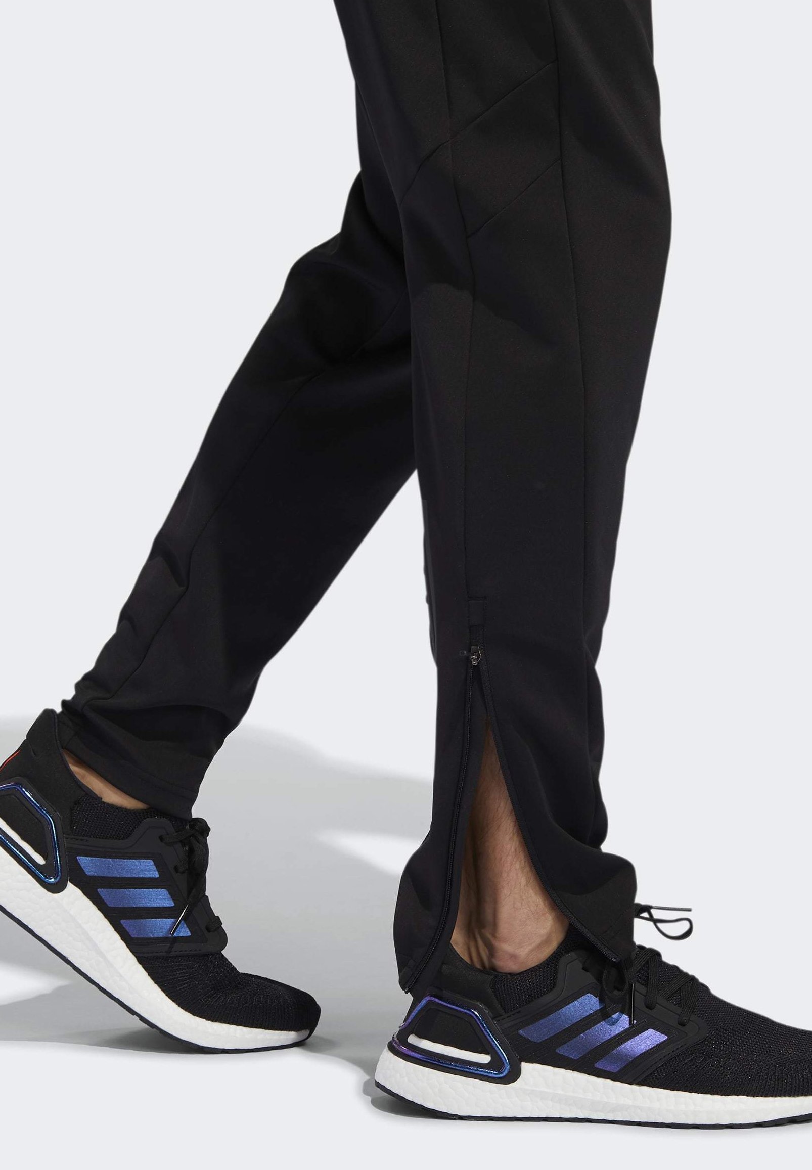 adidas Performance OWN THE RUN ASTRO JOGGERS - Tracksuit bottoms - black -  Zalando.de
