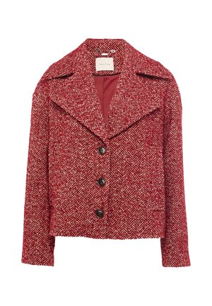 Veste en tissu pied-de-poule rouge avec larges revers, quatre boutons noirs et ouverture sur le devant. Doublure intérieure d'une couleur unie.