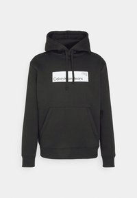 Calvin Klein Jeans HYPER REAL BOX LOGO GENDERLESS UNISEX - Jersey con capucha - black