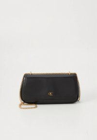 Black leather clutch with gold chain strap and small gold "cK" logo on front, set against a plain white background.