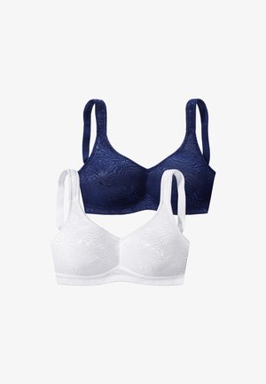 Two bras: one navy blue with a subtle pattern, and one white, both with wide straps and a smooth texture.