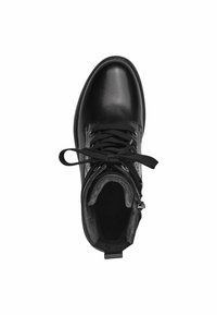 Bottines en cuir noir avec un bout rond, un laçage à l'avant et un doublure en peluche. Comprend une fermeture éclair latérale pour un accès facile.