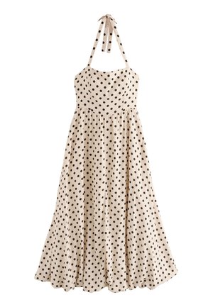 Beiges Kleid mit schwarzen Punkte, mit Neckholder-Design, tailliertem Oberteil und fließendem Rock. Hergestellt aus leichtem Stoff mit einer weichen Textur.